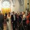 Newlyweds exiting church after ceremony